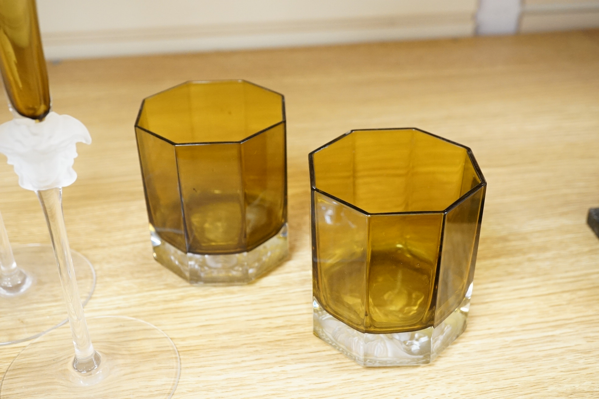 Five Versace Medusa Lumiere green champagne flutes and two similar tumblers, flutes 30cm high